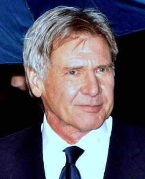 Harrison Ford smiling at the 2010 César Awards in Paris