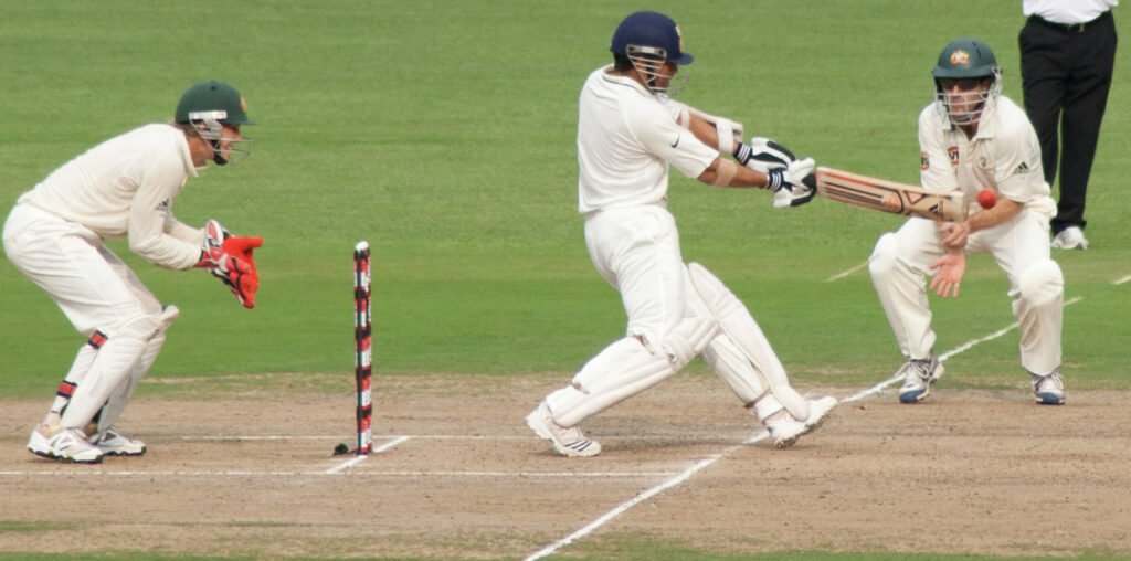 Sachin Tendulkar driving the ball against Australia in Bangalore