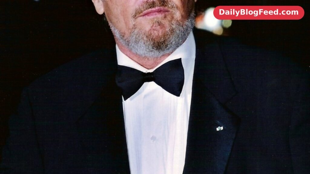 Jack Nicholson in a tuxedo and sunglasses at a formal event in 2002