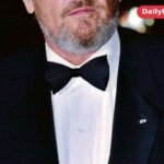 Jack Nicholson in a tuxedo and sunglasses at a formal event in 2002