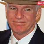 Steve Martin wearing a hat and dark suit at the Baby Mama premiere in 2008
