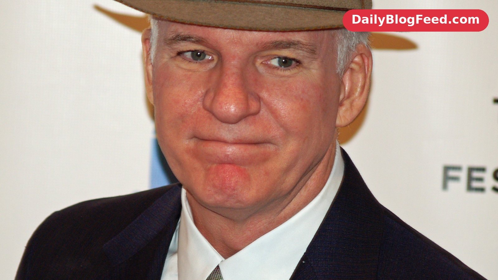 Steve Martin wearing a hat and dark suit at the Baby Mama premiere in 2008