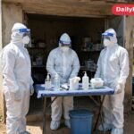 Health workers in protective equipment at a clinic entrance in West Africa