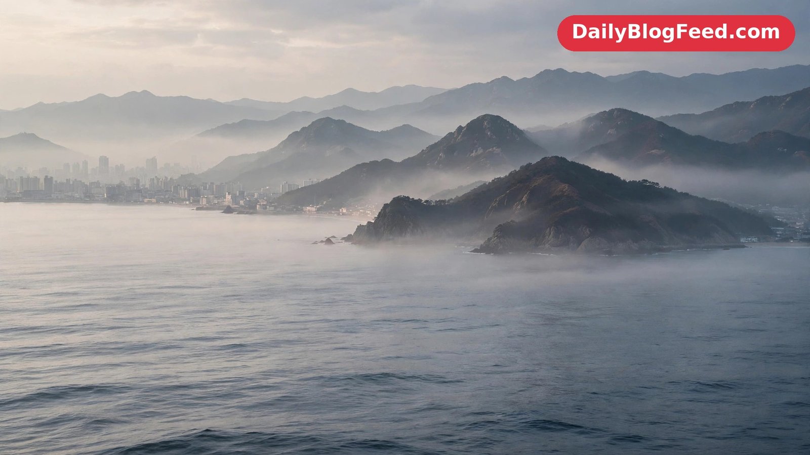Korean peninsula coastline at dawn seen from the sea